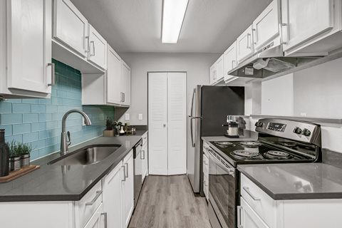 Upgraded kitchen with subway tile backsplash